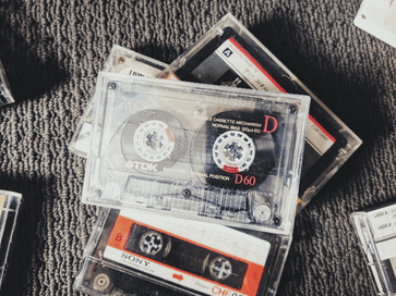 small collection of tapes laid out on carpet